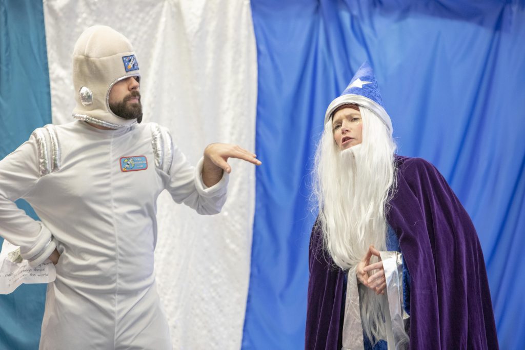 Waterfall Wizard and Rocket Ron children's entertainers are having fun at this kids' Christmas party in London