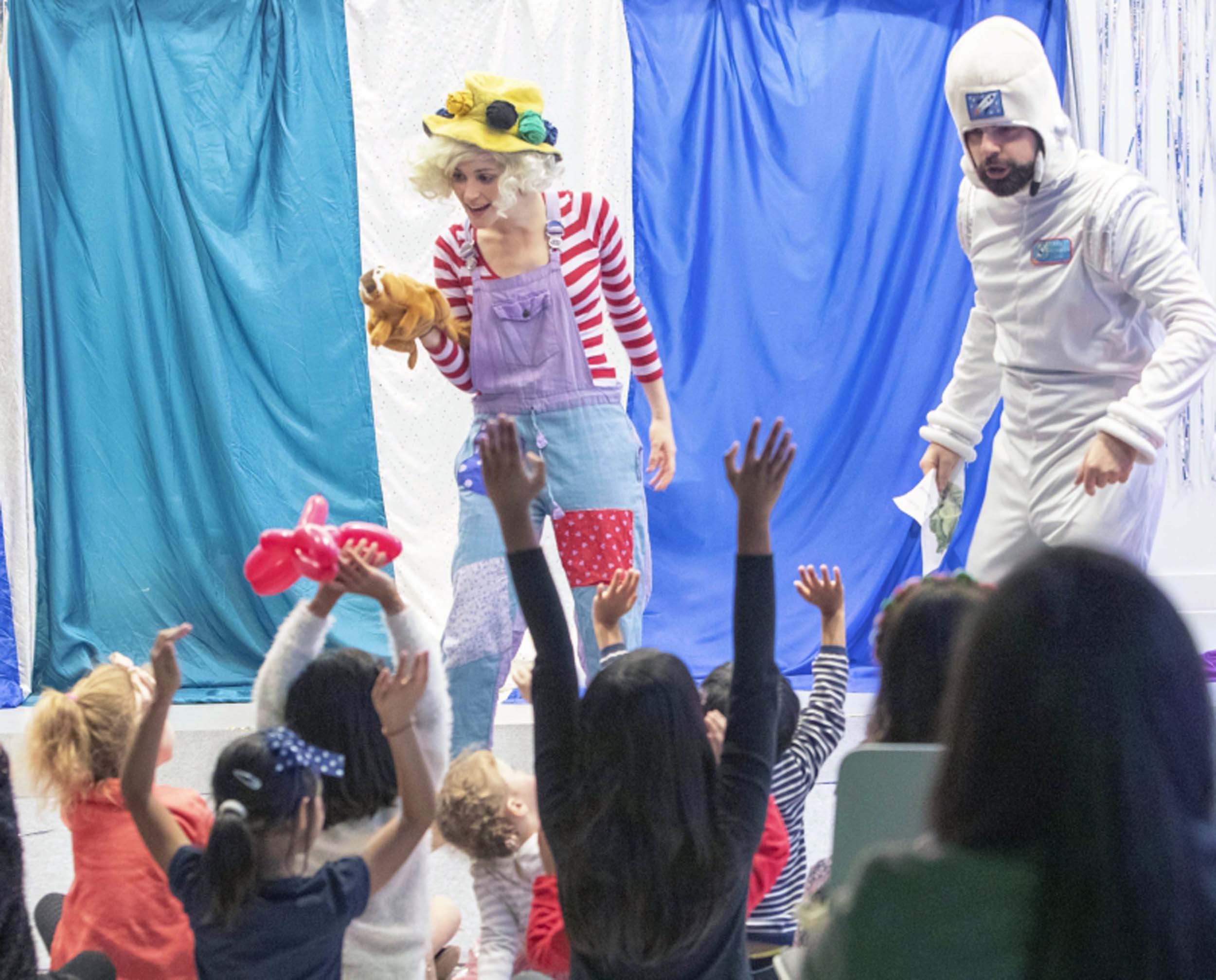 Rocket Ron and Silly Billie children's entertainers need the kids to help them get to the Moon at this space themed party in London