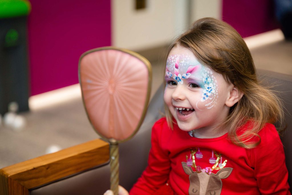 Children's face-painting by the Bedlam Bunch at corporate London party